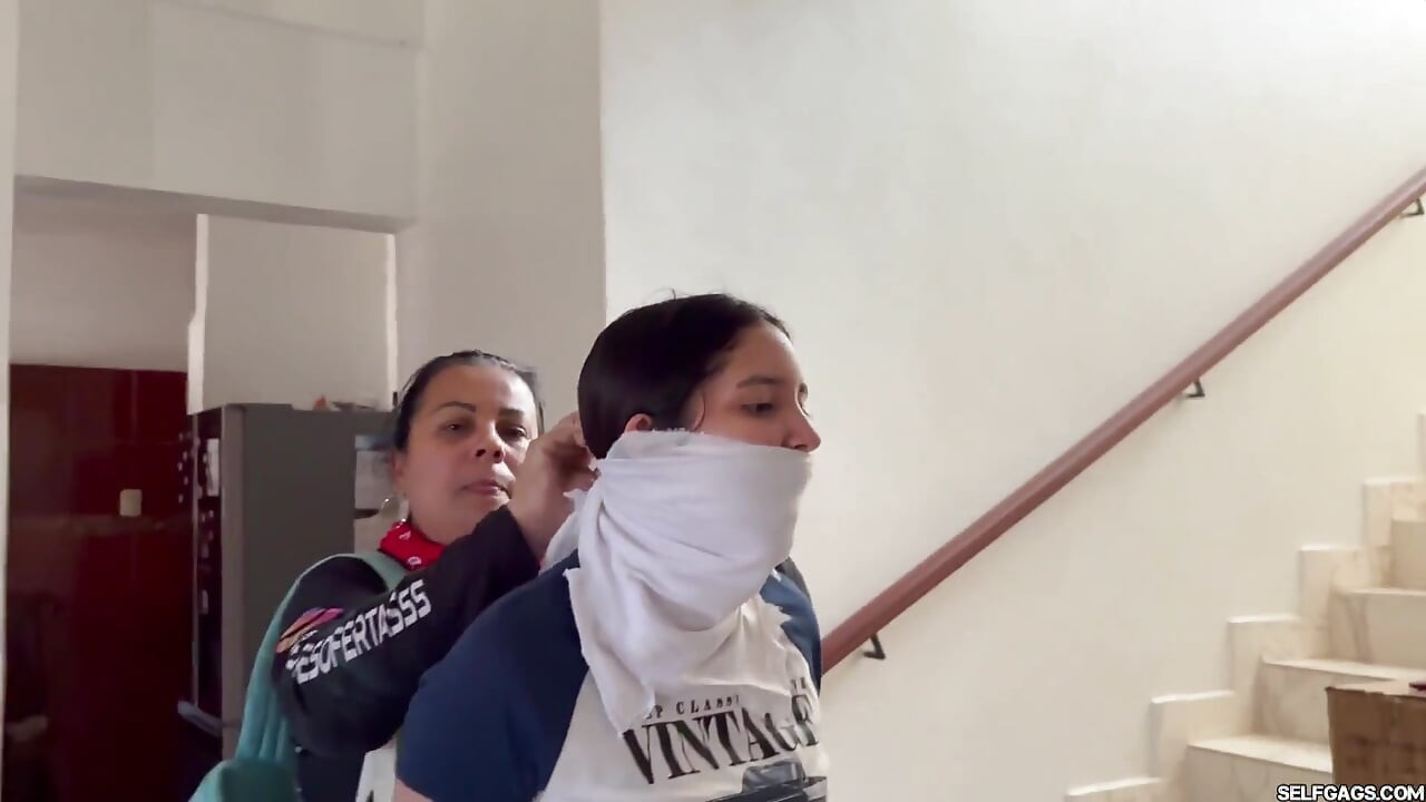 Fantasizing 18-year-old Taped & Gagged by Masked MILF