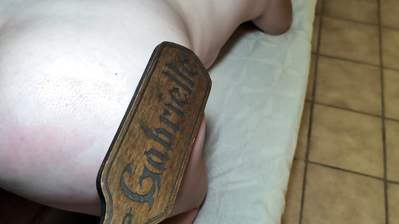 I redden her ass with a paddle