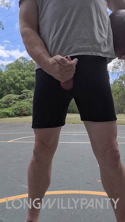 Straight guy hanging out his uncut cock at the public space.