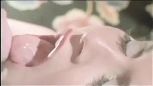 A sweet bitch has some trouble to eat John Holmes's huge cock