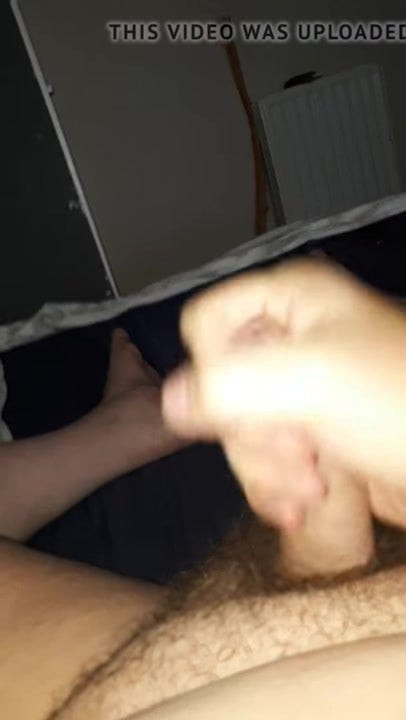 Masturbating