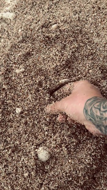 British Dannyroyal Playing around with the sand on the beach