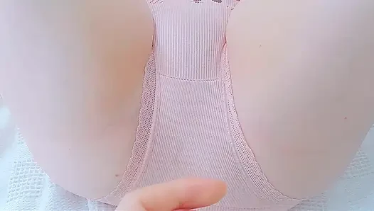 under the covers wearing pink panties