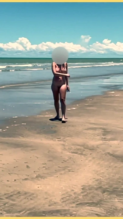 Jaw-dropping moment from "Wifey strips nude and plays with the football at the beach"