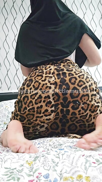 POV: Playful Hijabi Girl in a Leopard Skirt