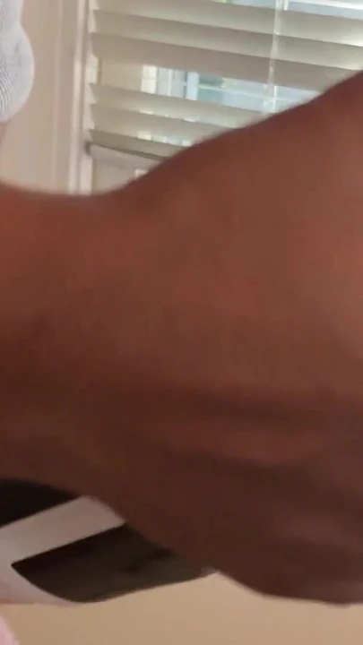 Iconic moment from "Automasturbator Milks Big Load of Cum Out of Black Man in Tank Top and Cock Ring"
