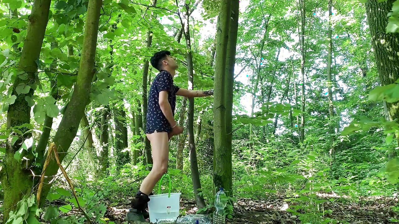 Balls Stretching Outdoor with Bucket Filled with Water and Jerk off