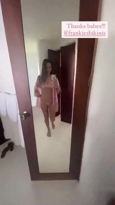 Olivia Munn mirror selfie in pink bikini