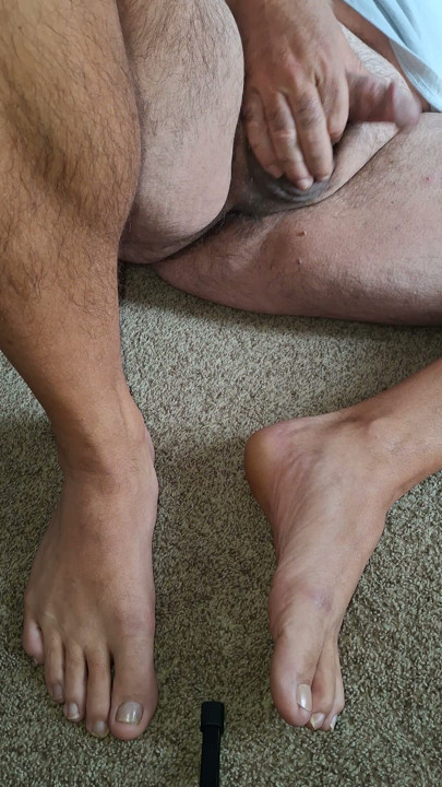 Massaging my balls and playing with my cock barefoot