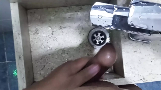 I jerk off in the hotel bathroom sink.