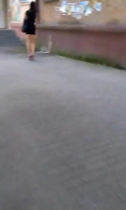 Ukrainian  beauty in a short dress with heels
