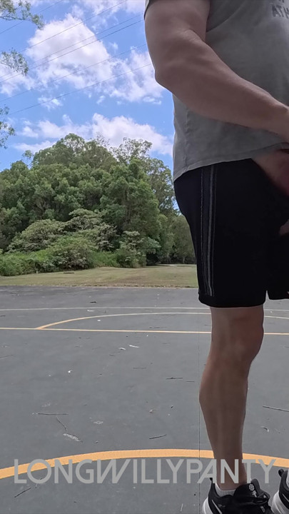 Straight guy hanging out his uncut cock at the public space.