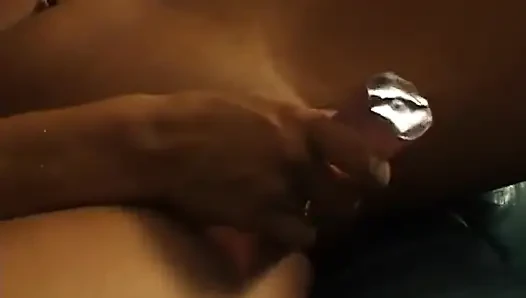 Lonely brunette chick is filling her pussy with a big dildo