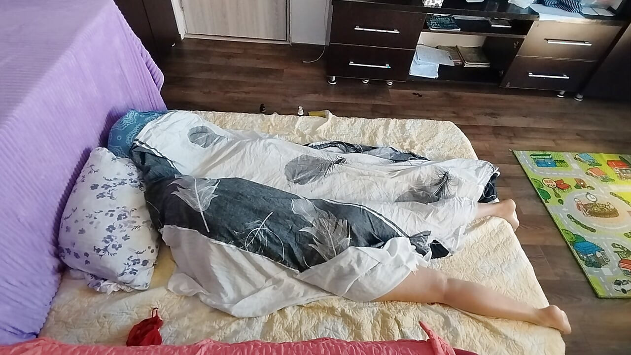 Sensual massage of a hot amateur couple with oil on the body.