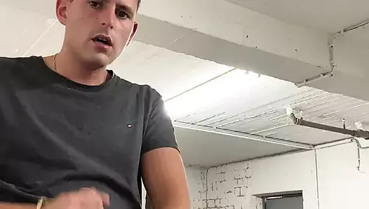 Handsome German boy jerks off in the storage room at work until he cums