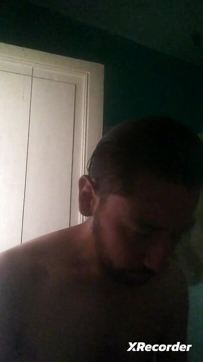 Man does his skincare in the morning