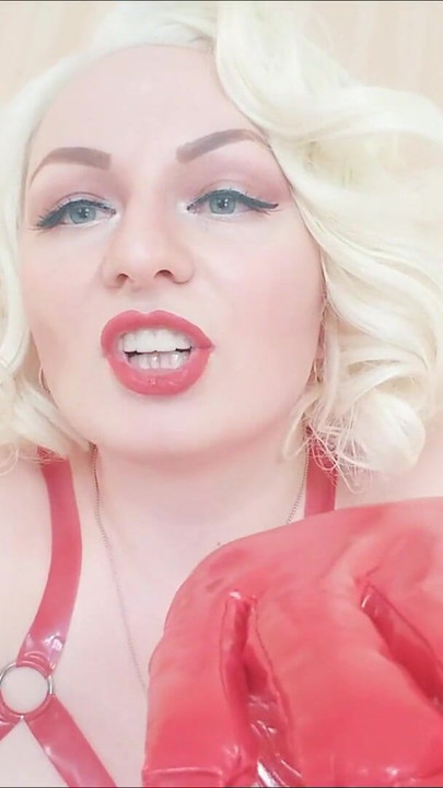 Emotional moment from "Strap-on POV video: topless Mistress in thigh high over knee boots with long gloves - Arya Grander"