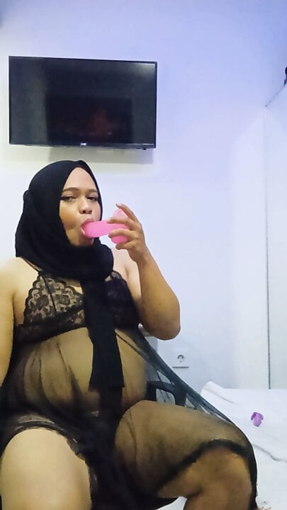 Hijab Crossdresser Masturbates and Plays With Her Toys