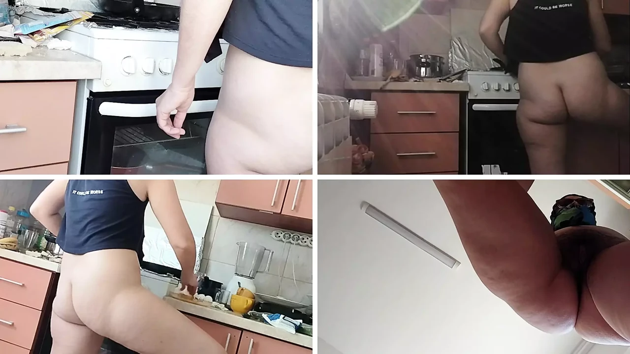 Sexy naked wife preparing food in the kitchen.