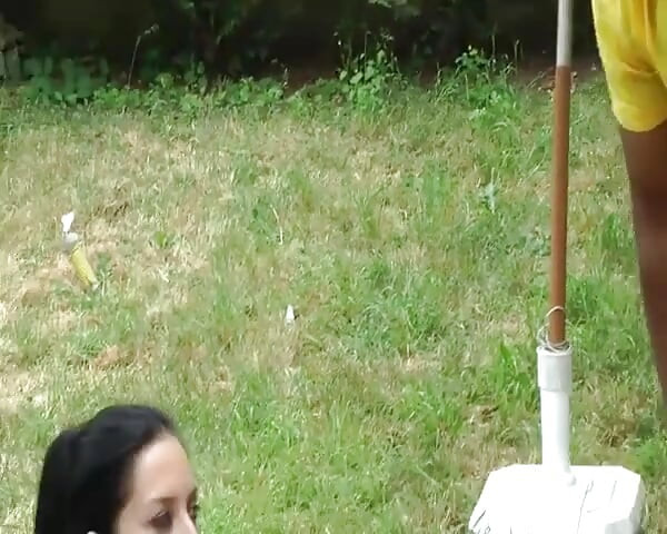 A Pretty Brunette Is Being Fucked by Three Big Cocks in the Garden.