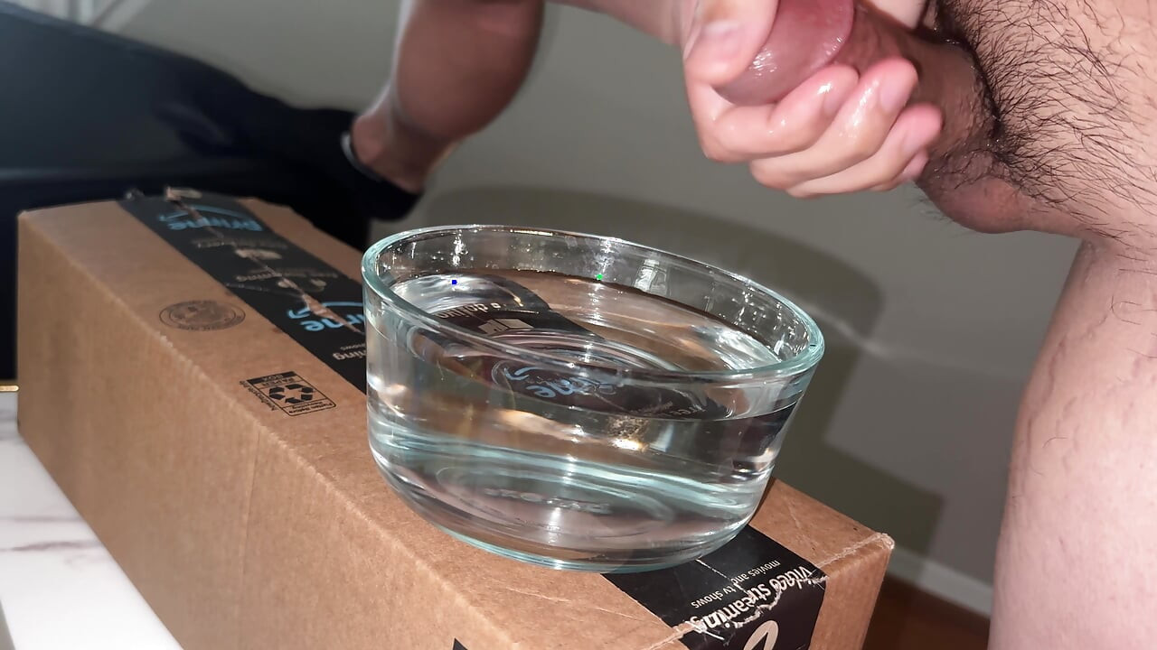 Jerking off in a bowl of water
