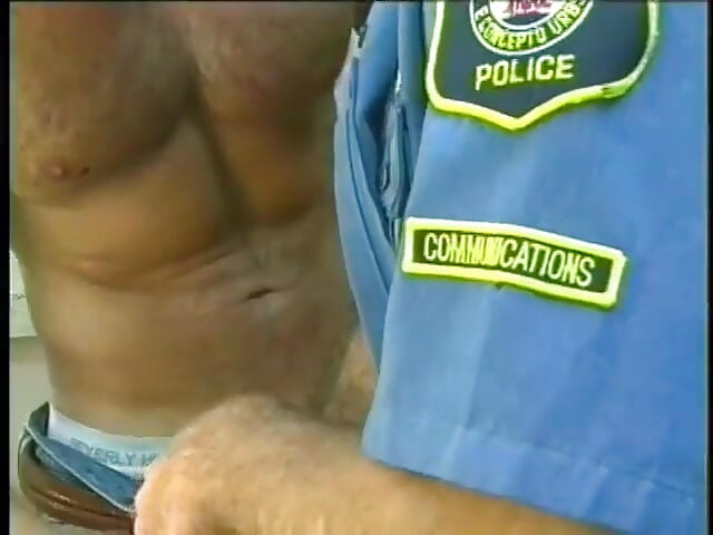 Muscular man in uniform and wearing glasses sucks and blows his colleague's hot cock