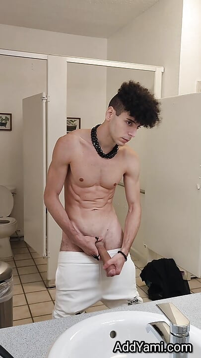 Stroking in public bathroom hoping to not get caught