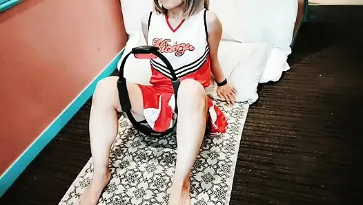 A cute, busty married woman does exercise 1 in an erotic cheerleader costume. Home made amateur Private Shoot