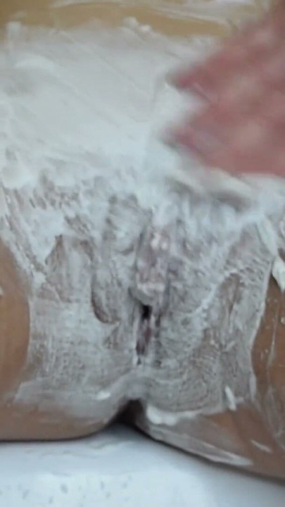 Close-up of shaving the vagina with a trimmer and a razor. | Clip 1
