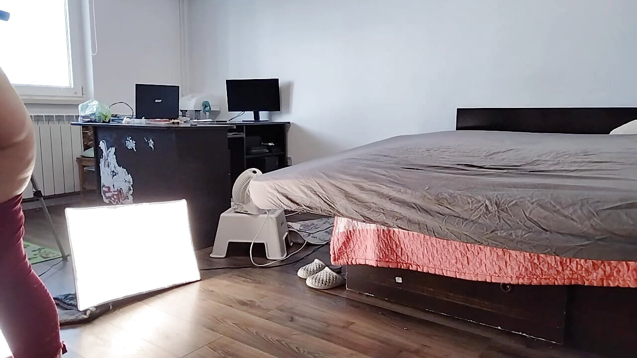 Sexy Latina Having Fun Trying on Clothes and Cutting Them.