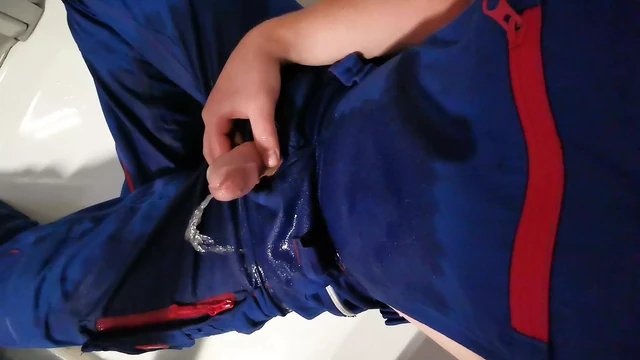 in horny work gear pissing and cumshot