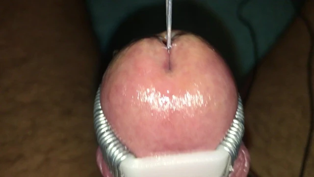 My electro tortured cockhead completely swallows a 13mm rod