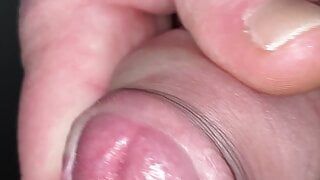 Close up edging tight foreskin with big cockhead