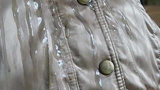 Guy ejeculating on second hand gold nylon jacket - part 6