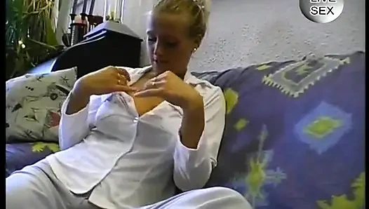 Busty blondie dildoing her twat in solo video