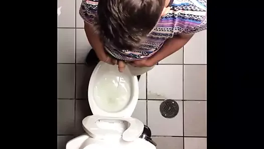 Circumcised boy with a big penis peeing