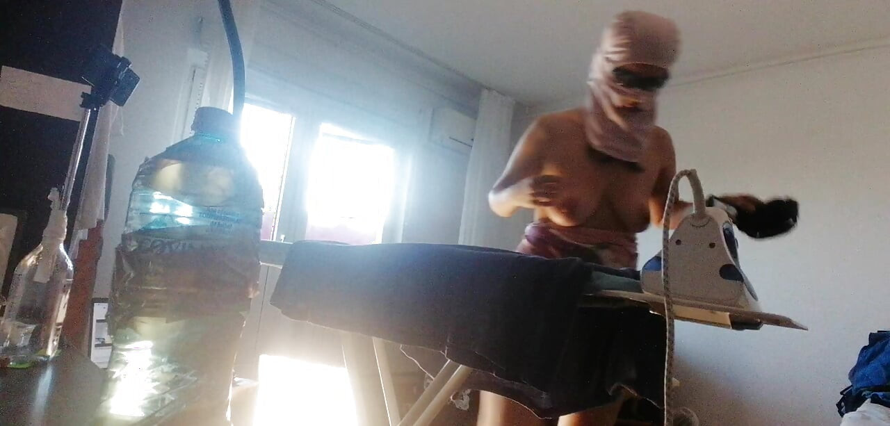 Sexy wife does housework naked. Hot hairy Latin hair, big tits, big ass.