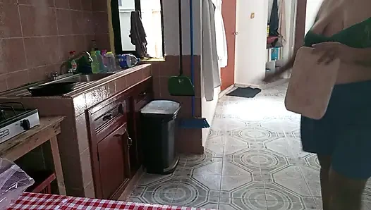 Mom in the kitchen in bralett