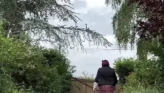 Dressed in a little plaid suspender skirt for an evening
