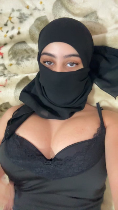 Muslim Girl in Hijab Lays in Bed and Gently Squeezes Her Arab Boobs While Her Titties Bounce Softly