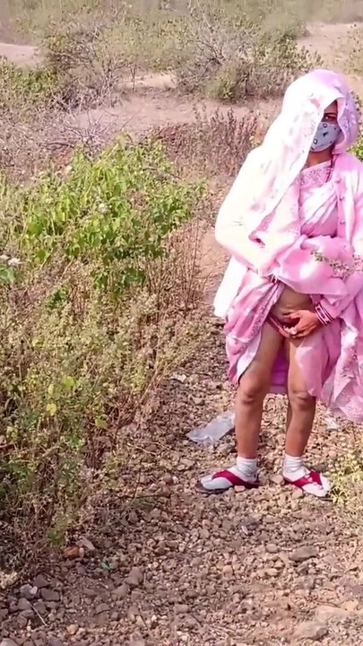 Sister-in-law is walking on the bridge by the roadside, getting down on the shore, sister-in-law started taking her clothes from the toilet and fingering her pussy. | Clip 1