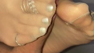 Nylon Footjob with silver polished toenails and toerings