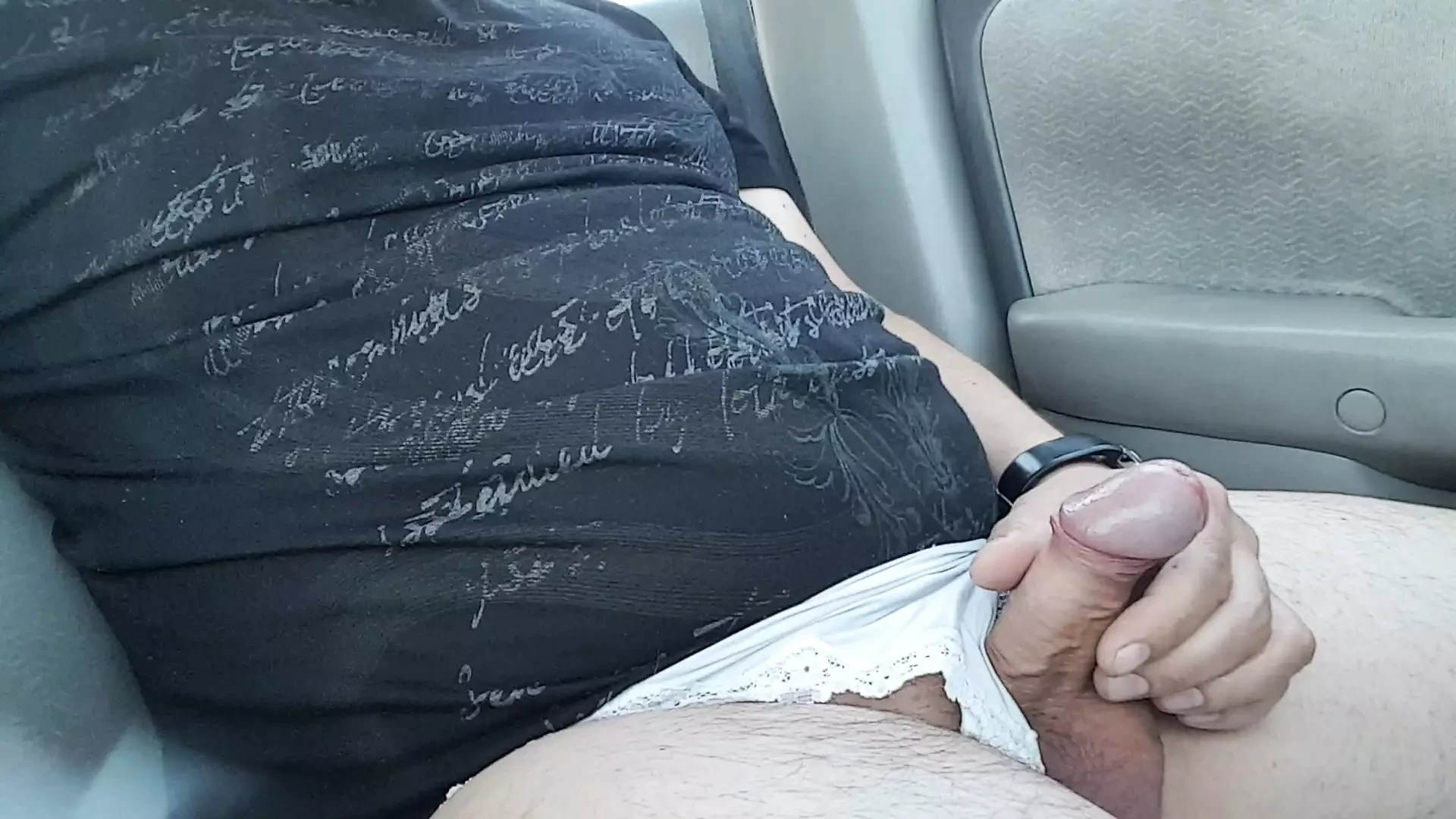 Masturbating