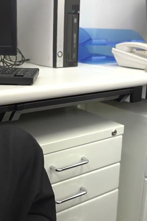 Female Office Worker in Black Pantyhose