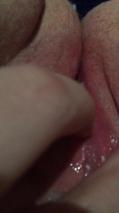 Masturbating