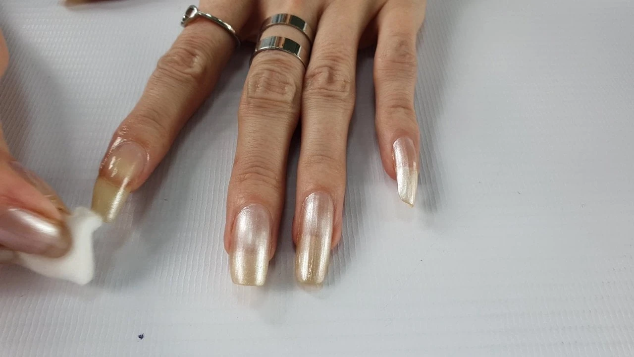 Girl called Fantasynail washes the polish off her long nai