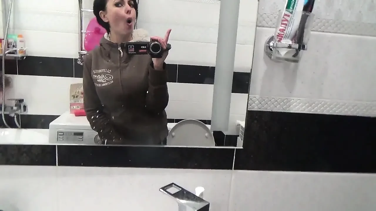 Pissing on the toilet long and a lot after long desperation and a lot of liquids
