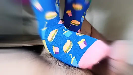 straw with feet wearing very funny stockings