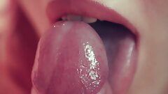 Cute Asian gently sucks and licks the cock close-up