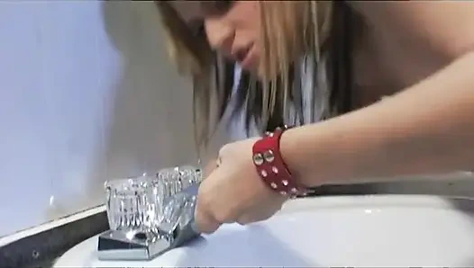 Blonde Babe in Red Boots Fingers Pussy on Toilet